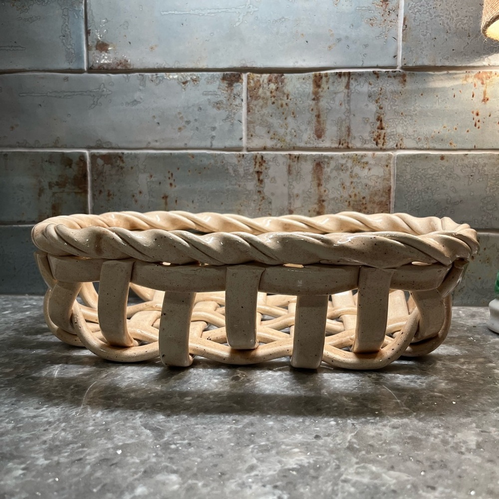 Vintage handmade, stoneware fruit bowl or breadbasket. Cream in color.